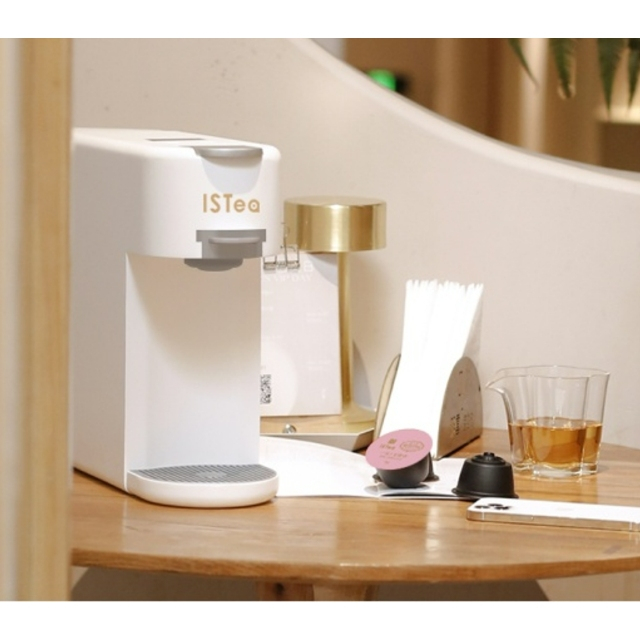 É um dispensador de chá de cápsula inteligente de chá